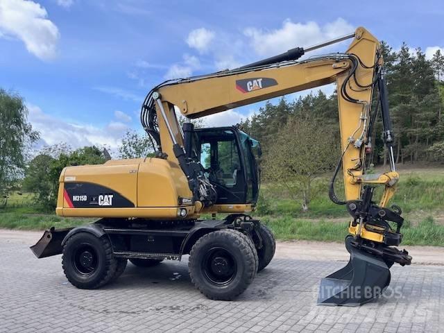 CAT M 315 D Excavatoare cu roti