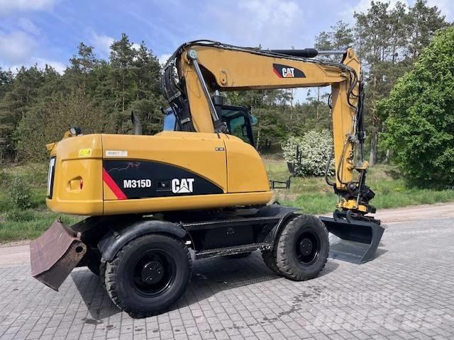CAT M 315 D Excavatoare cu roti