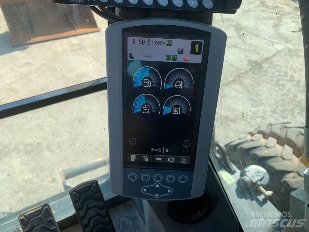 CAT M 318 F Excavatoare cu roti