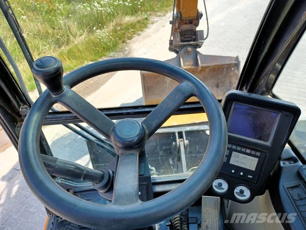 CASE WX 148 Excavatoare cu roti