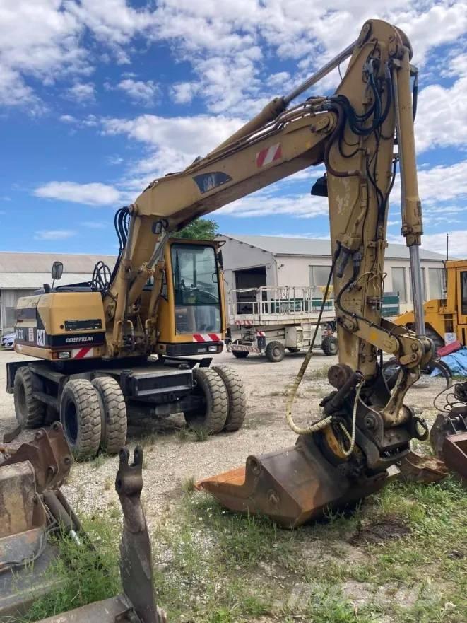 CAT M 312 Excavatoare cu roti