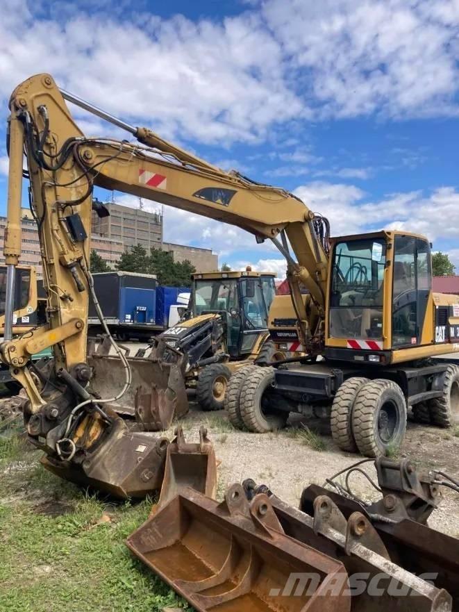 CAT M 312 Excavatoare cu roti