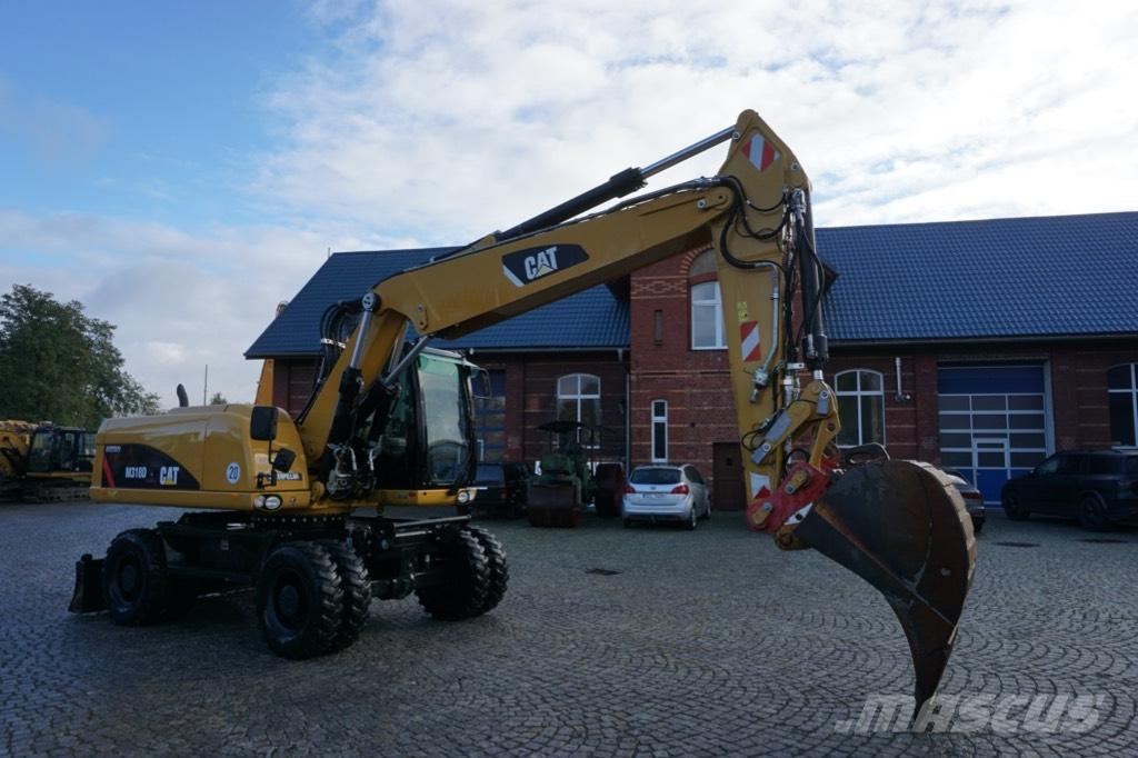 CAT M 318 D Excavatoare cu roti