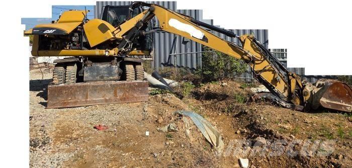 CAT M 313 D Excavatoare cu roti