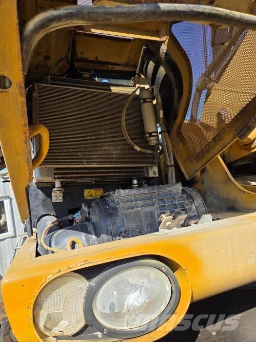 CAT M 313 D Excavatoare cu roti