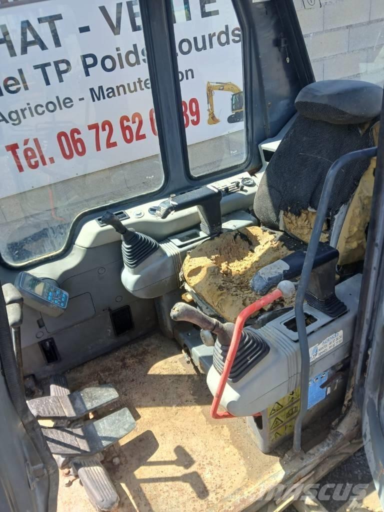 Komatsu PC 210 Cabine si interior