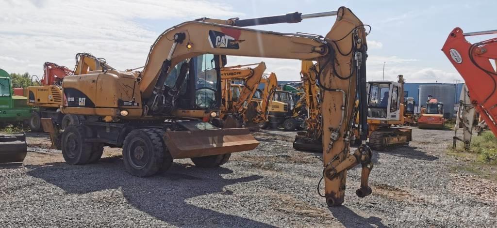 CAT M 315 D Excavatoare cu roti