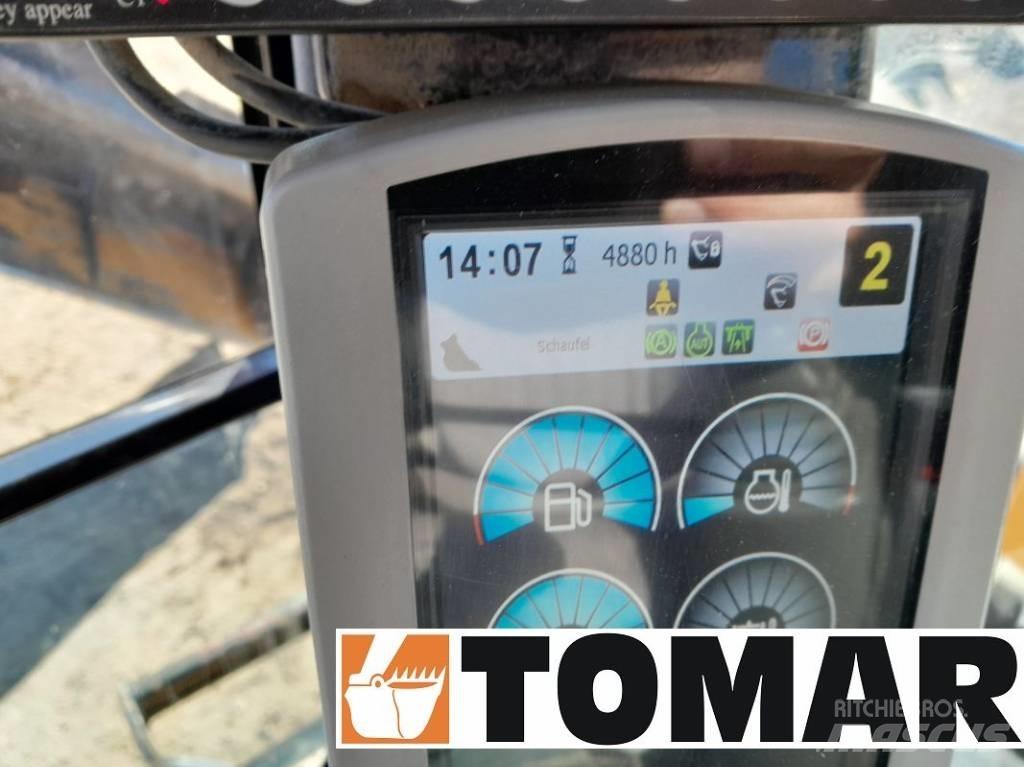 CAT M 314 F Excavatoare cu roti