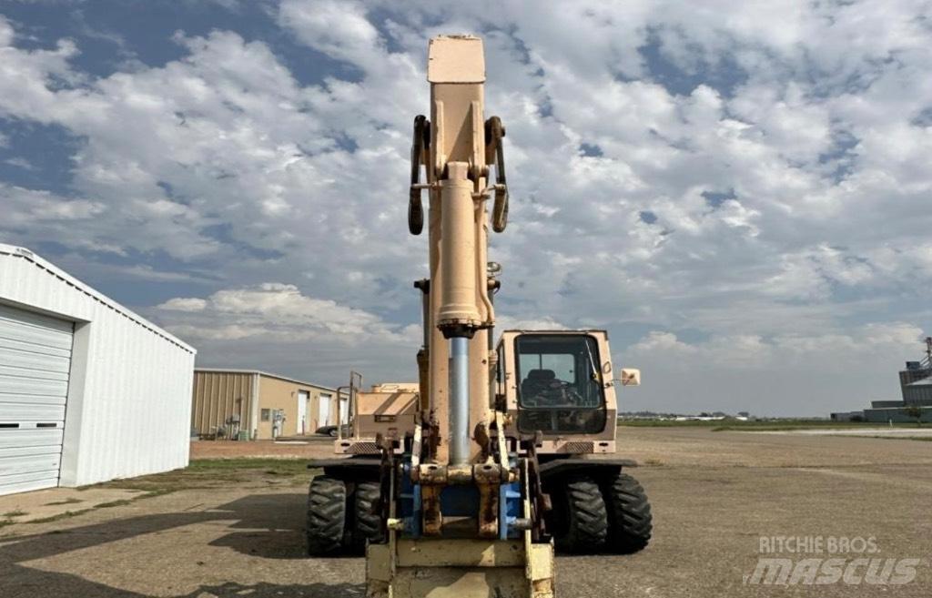 John Deere 595 Excavatoare cu roti