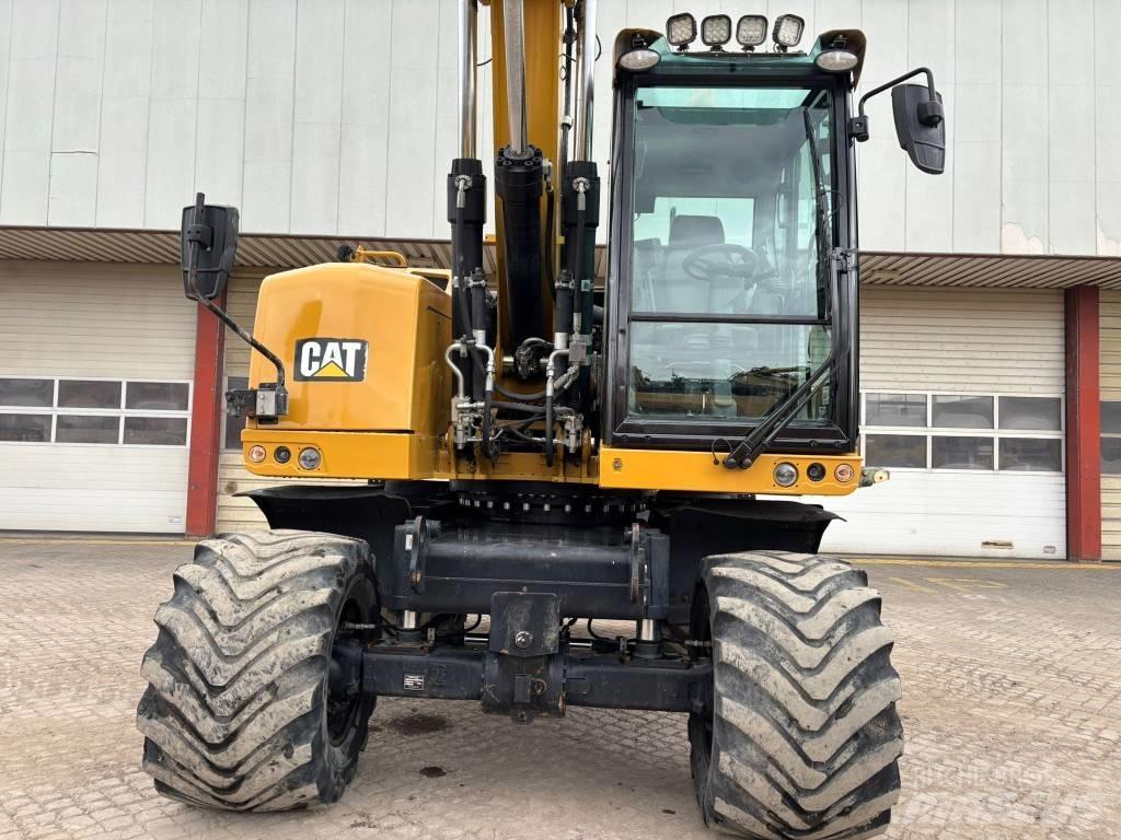 CAT M 318 F Excavatoare cu roti