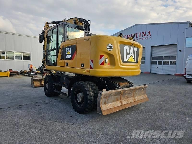 CAT M 318 F Excavatoare cu roti