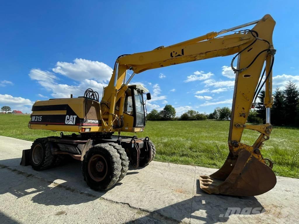 CAT M 315 Excavatoare cu roti