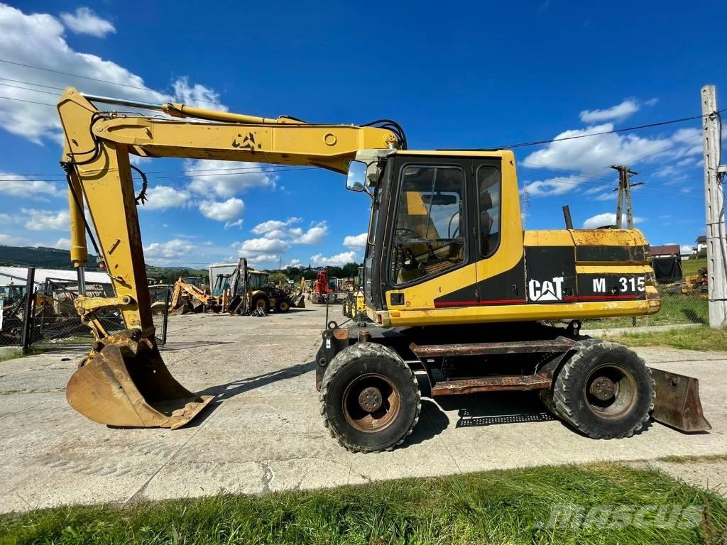 CAT M 315 Excavatoare cu roti