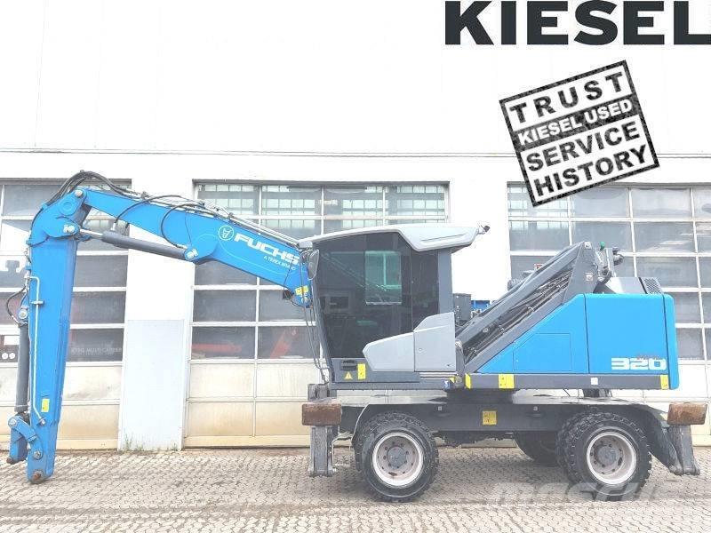 Fuchs MHL 320 F Paleta de manipulare