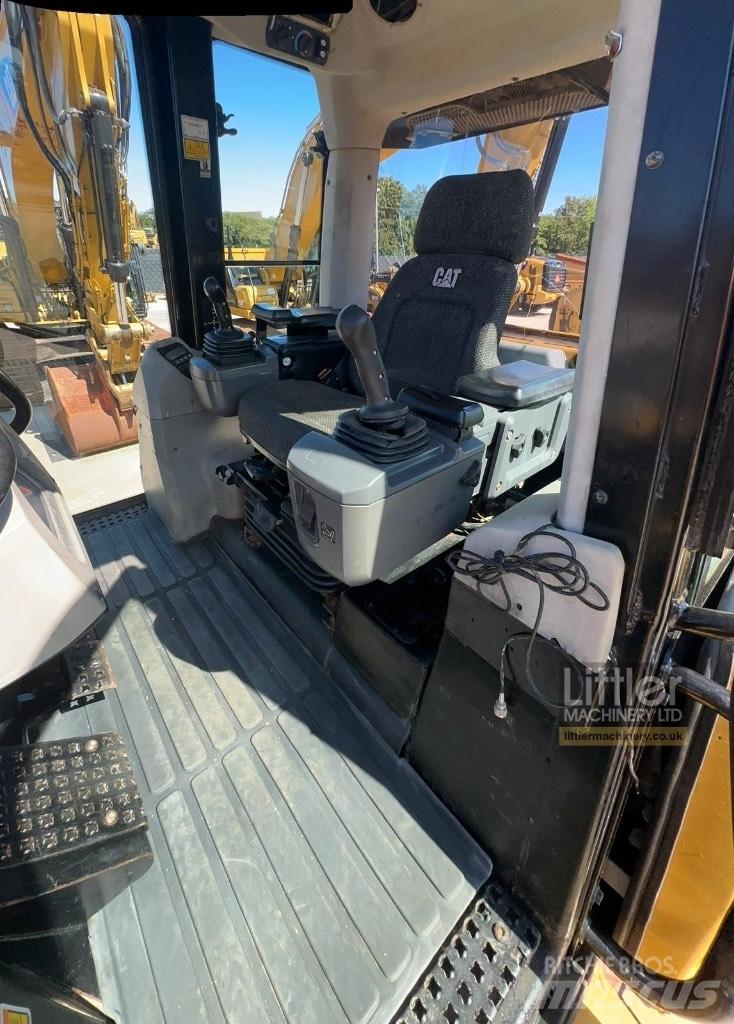 CAT 973D Încarcatoare cu excavator
