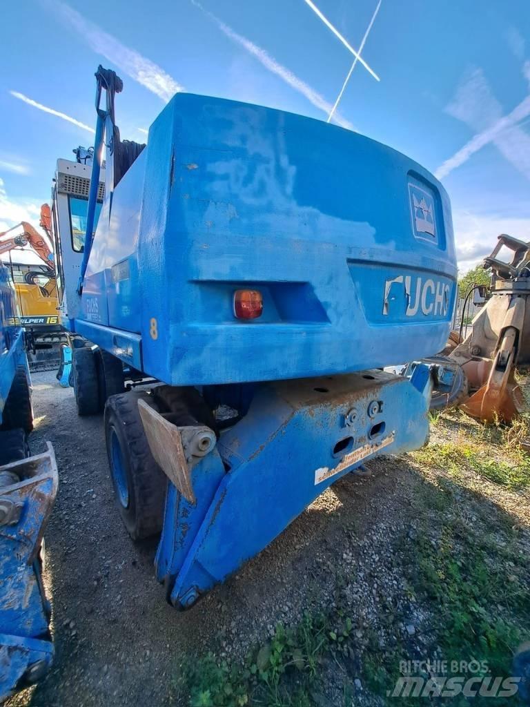 Fuchs MHL 350C Paleta de manipulare