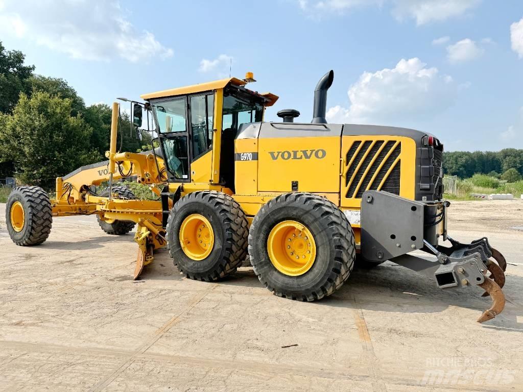 Volvo G970 + RIPPER Gredere