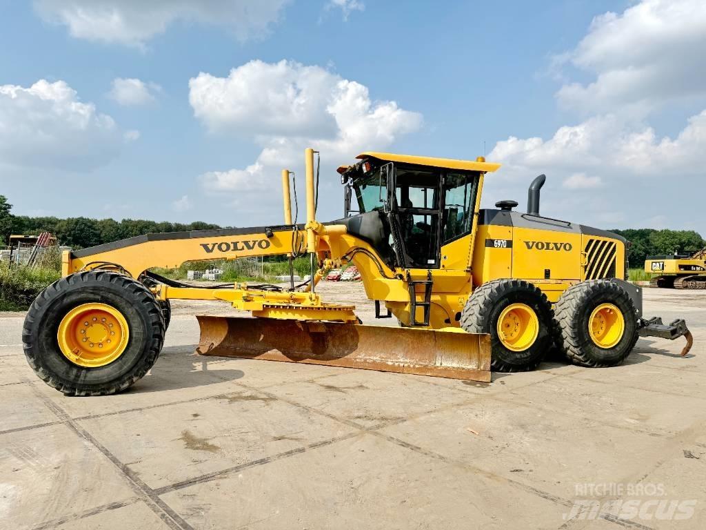 Volvo G970 + RIPPER Gredere