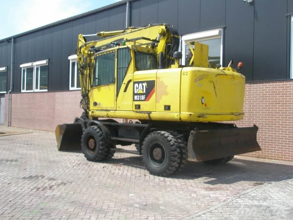 CAT M318F Excavatoare cu roti