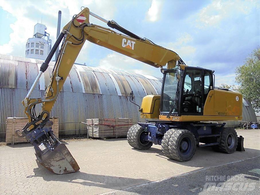 CAT M 320 F Excavatoare cu roti