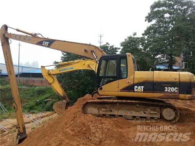 CAT 320 C Excavatoare cu brat lung