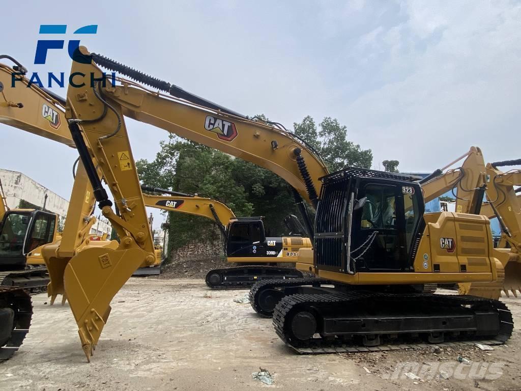 CAT 323 Excavatoare 7t - 12t