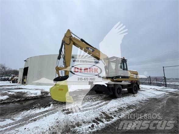 CAT M318D Excavatoare cu roti