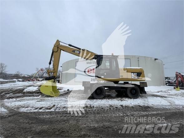 CAT M318D Excavatoare cu roti