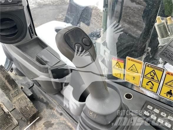 CAT M318D Excavatoare cu roti