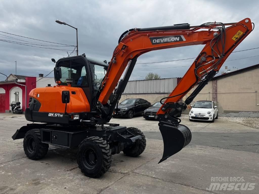Develon DX 57 W-7 Excavatoare cu roti
