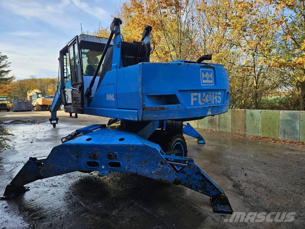 Fuchs MHL 320 D Paleta de manipulare