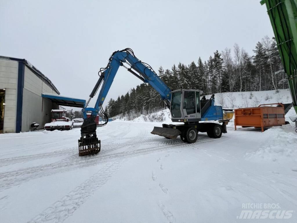 Fuchs MHL 320 Paleta de manipulare