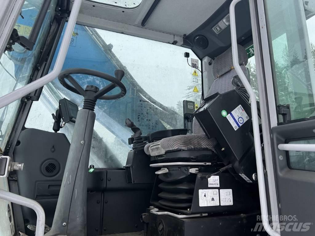 Fuchs MHL 320 Paleta de manipulare