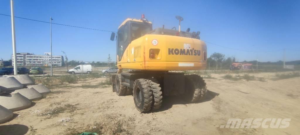 Komatsu PW 140-7 Excavatoare cu roti
