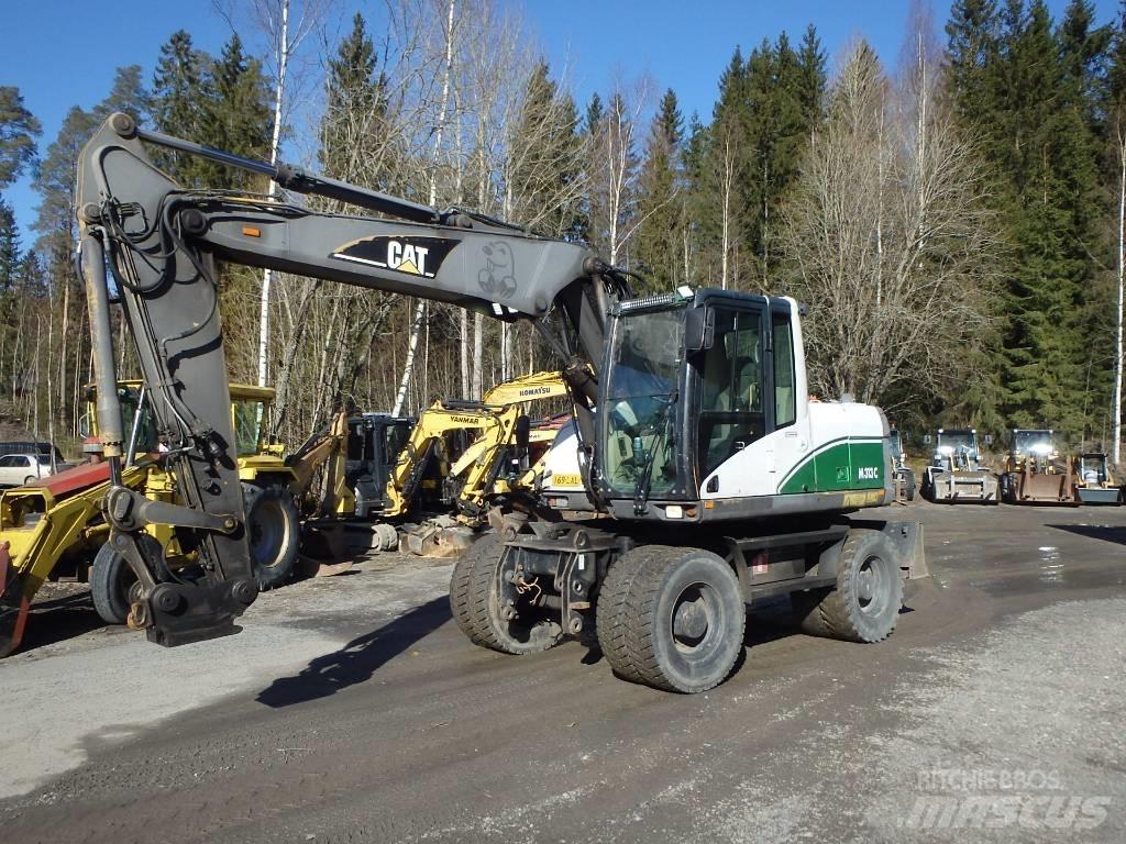 CAT M 313 C 4x4 Excavatoare cu roti