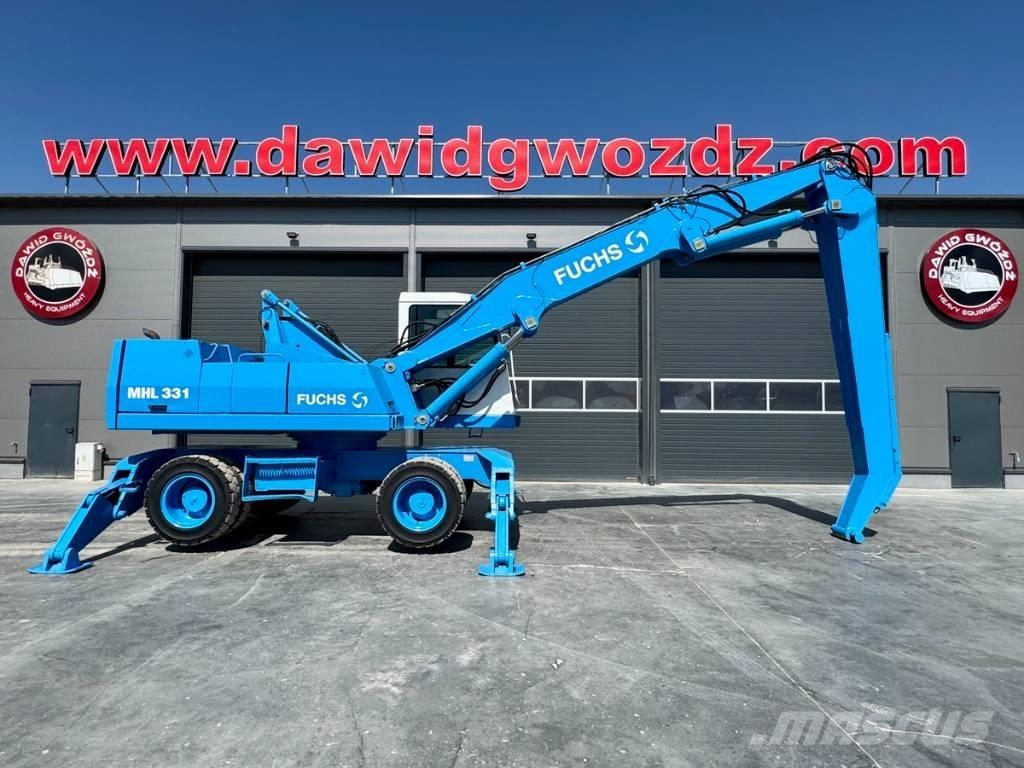 Fuchs MHL 331 Paleta de manipulare