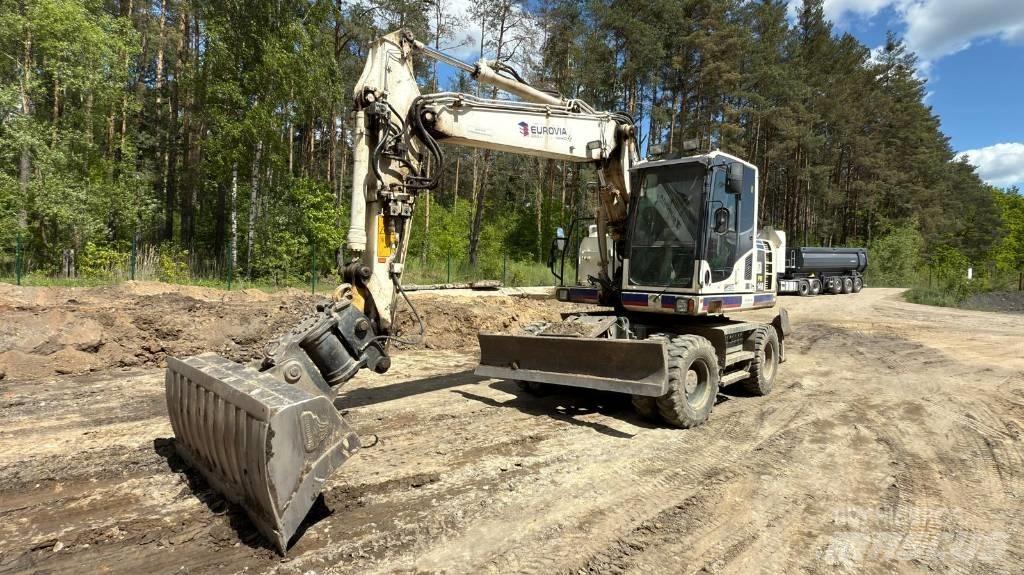 Komatsu PW 148-8 Excavatoare cu roti