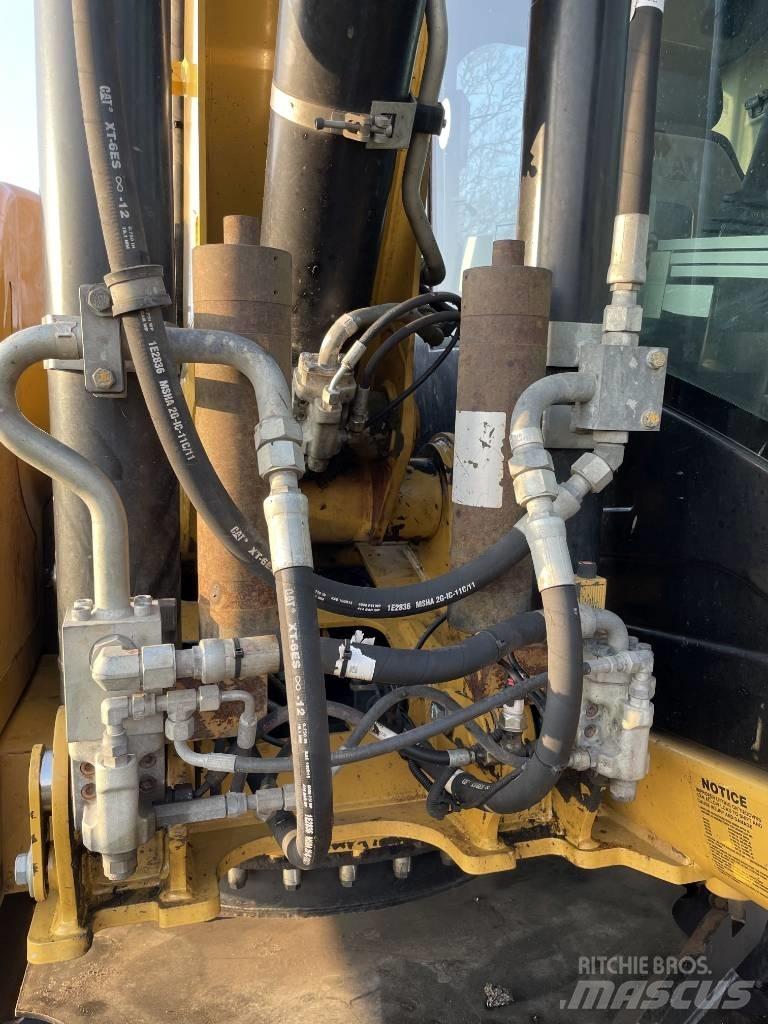 CAT M 313 D Excavatoare cu roti