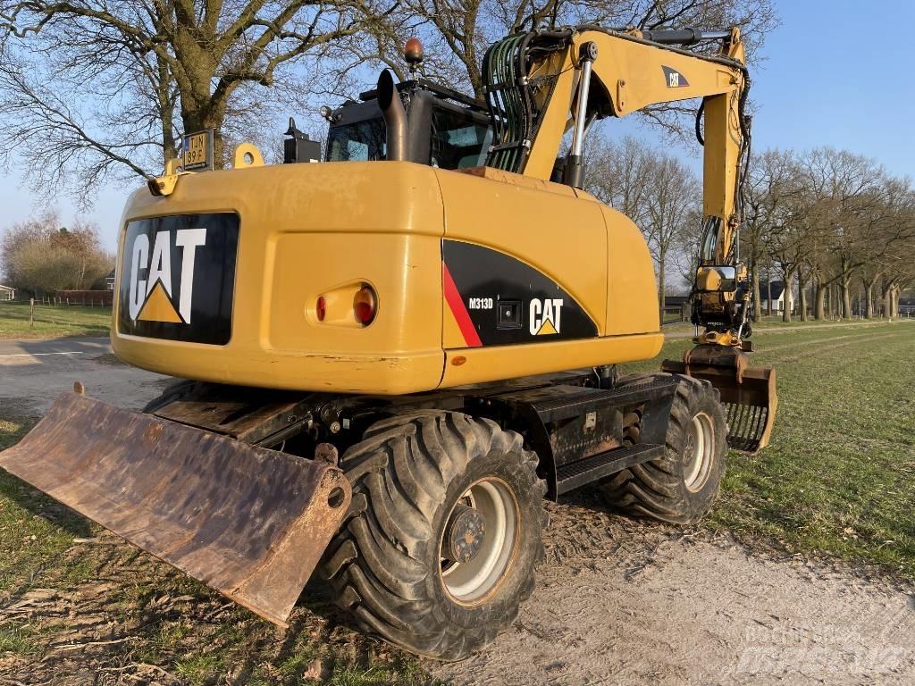 CAT M 313 D Excavatoare cu roti