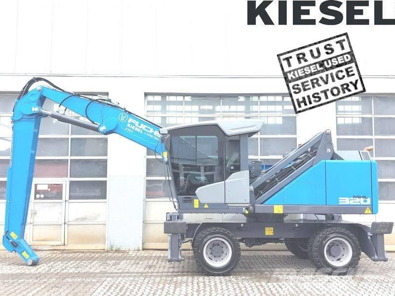 Fuchs MHL 320 F Paleta de manipulare