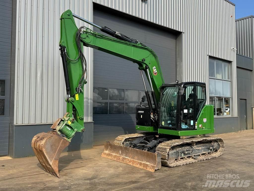 CAT 310 - 07A Excavatoare 7t - 12t