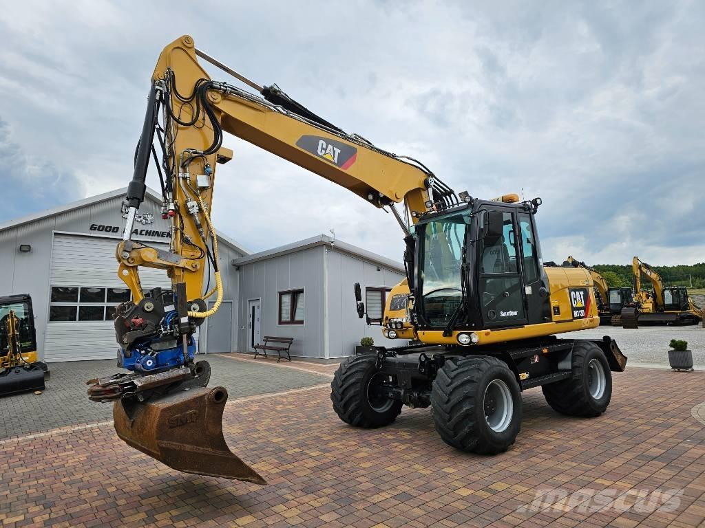 CAT M 313 D Excavatoare cu roti