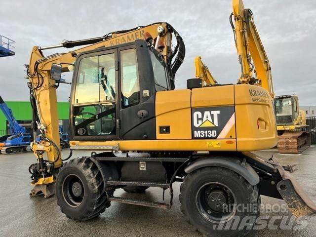 CAT M 313 D Excavatoare cu roti