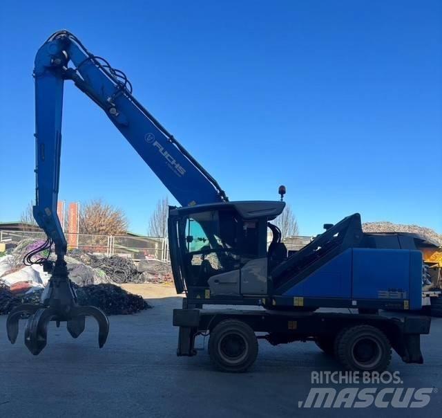 Fuchs MHL 331 Paleta de manipulare