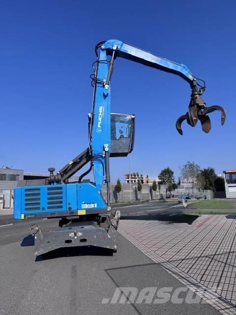 Fuchs MHL 331 Paleta de manipulare