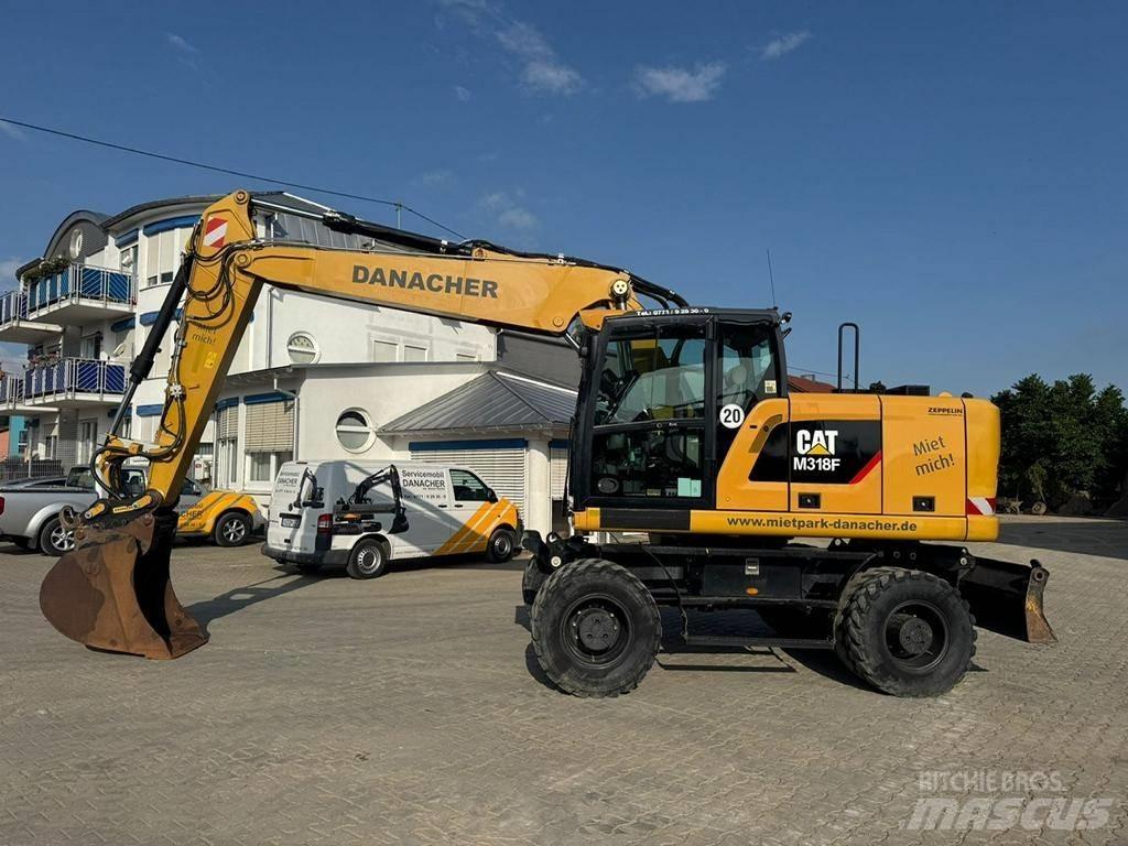 CAT M 318 F Excavatoare cu roti