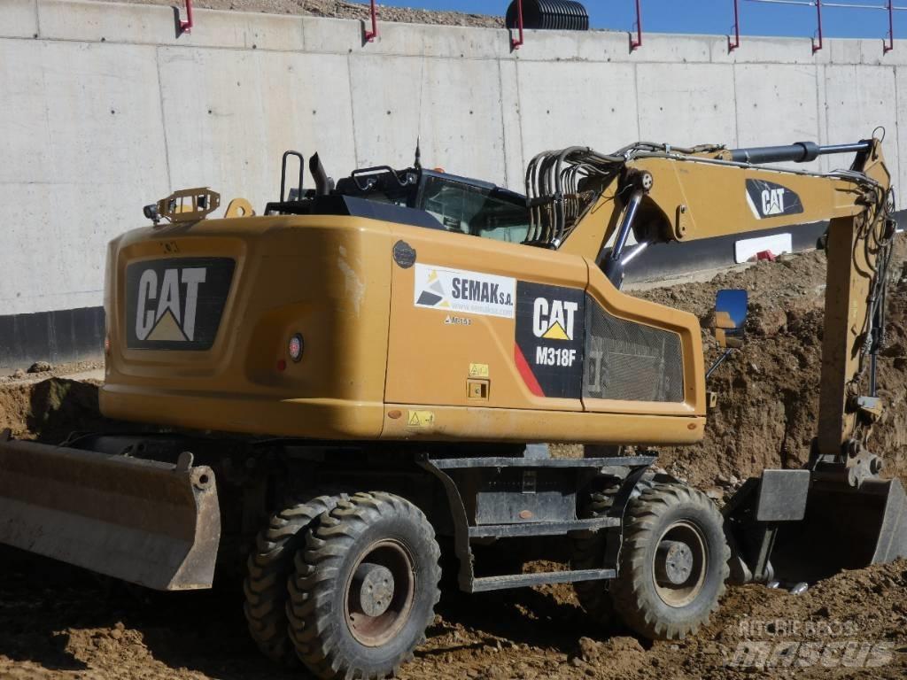 CAT M 318 F Excavatoare cu roti