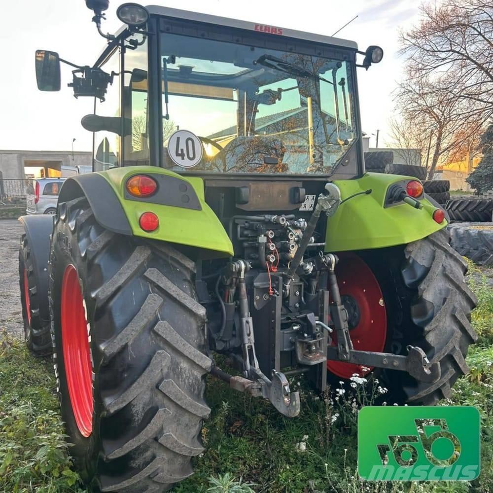 CLAAS Axos 320 Tractoare