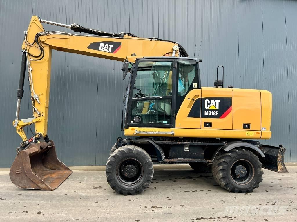 CAT M318F Excavatoare cu roti