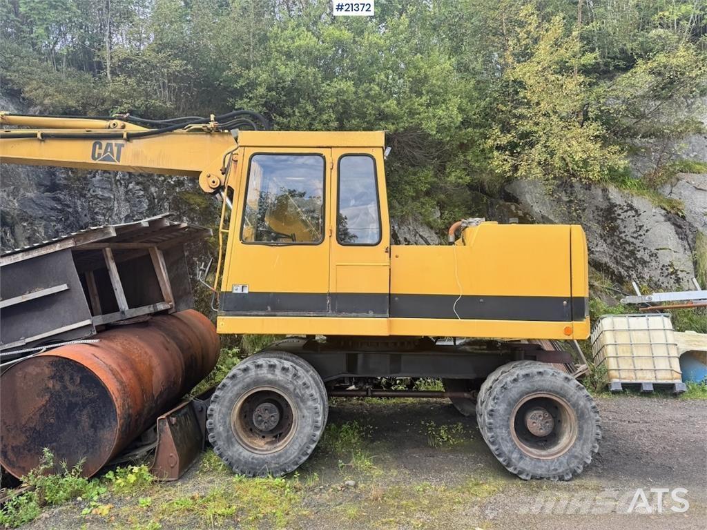 CAT 212B Excavatoare cu roti